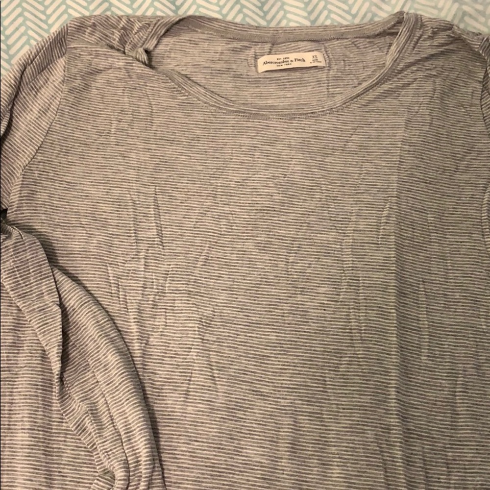 Grey and white striped long sleeve shirt
